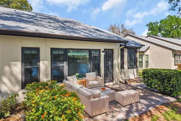 a room with a table and chairs
