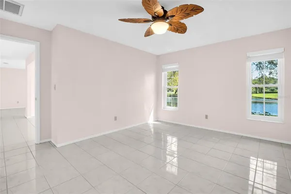 a view of a garden with a building in the background