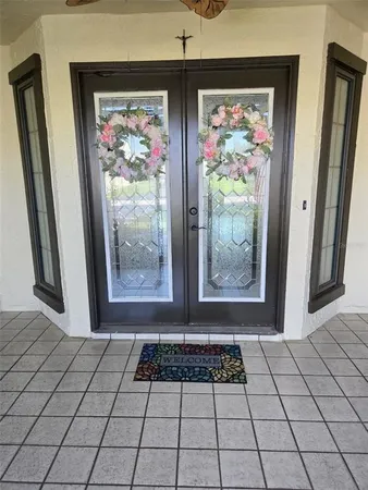 a view of a bathroom with a glass door shower