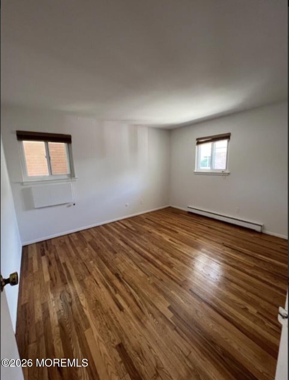 711 Wall Road, Unit 14 Spring Lake Heights, NJ 07762 - Photo 5 of 8 a view of empty room with wooden floor