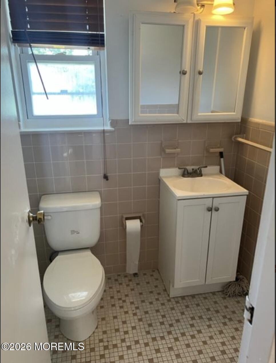 711 Wall Road, Unit 14 Spring Lake Heights, NJ 07762 - Photo 7 of 8 a bathroom with a toilet and a sink