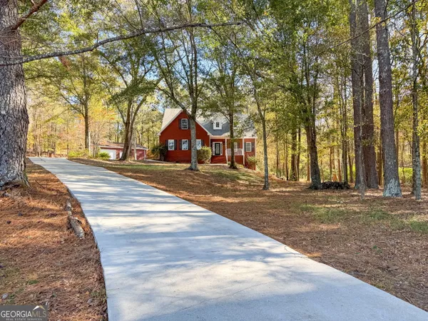 a house with trees in front of it