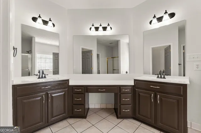 a view of storage and utility room with closet