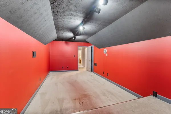 a kitchen with a stove a sink and a refrigerator