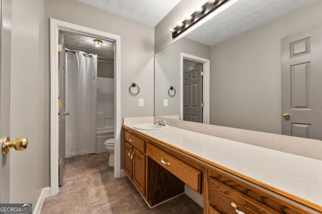 a view of cabinets and utility room