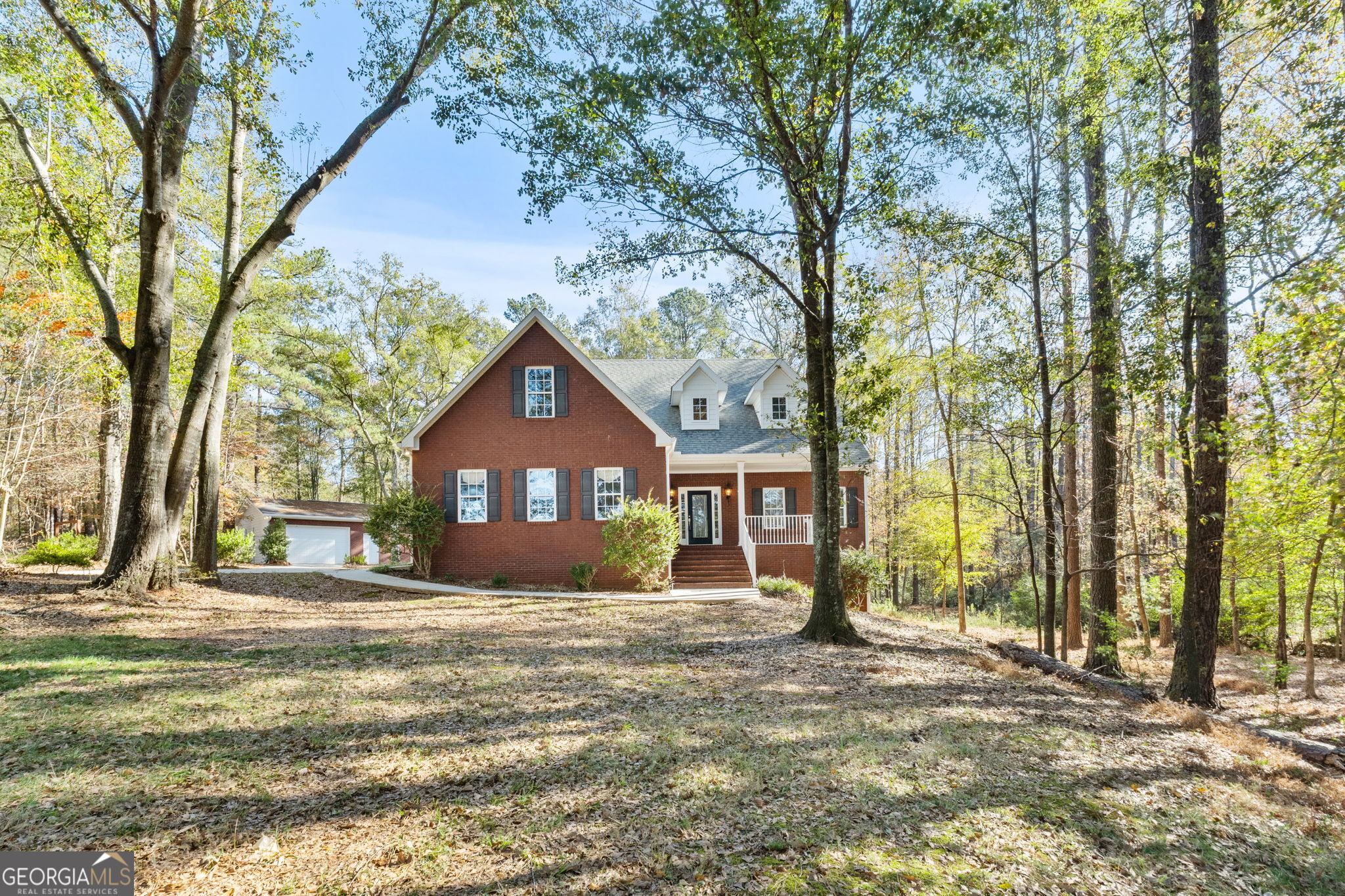 400 Moseley Road Stockbridge, GA 30281 - Photo 4 of 70 a front view of a house with a yard