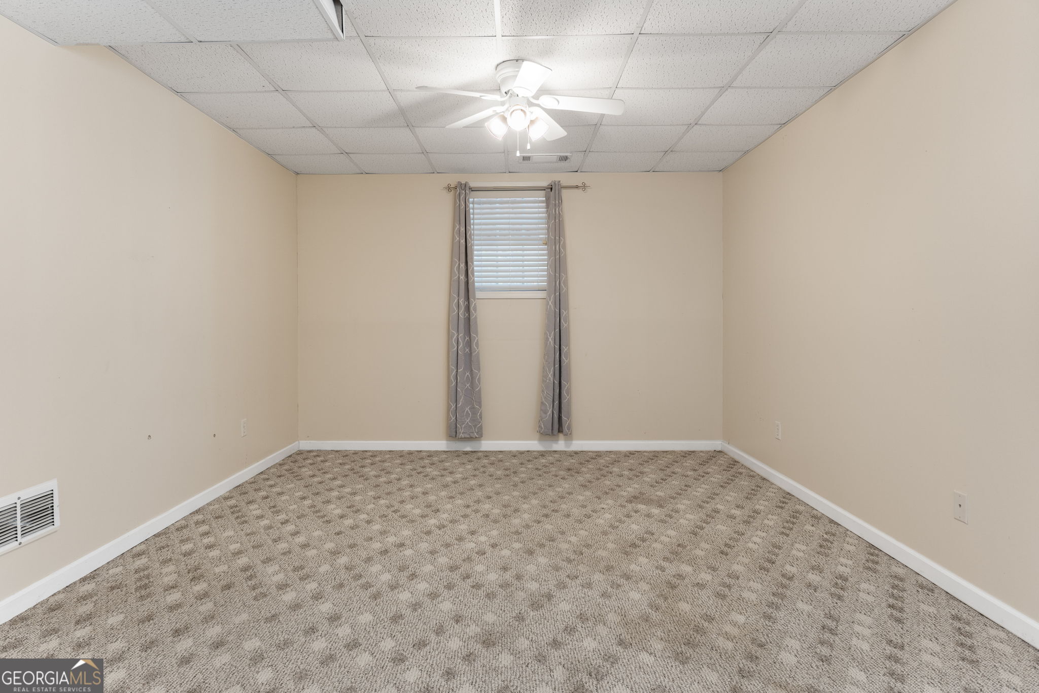 400 Moseley Road Stockbridge, GA 30281 - Photo 43 of 70 a view of an empty room and chandelier fan
