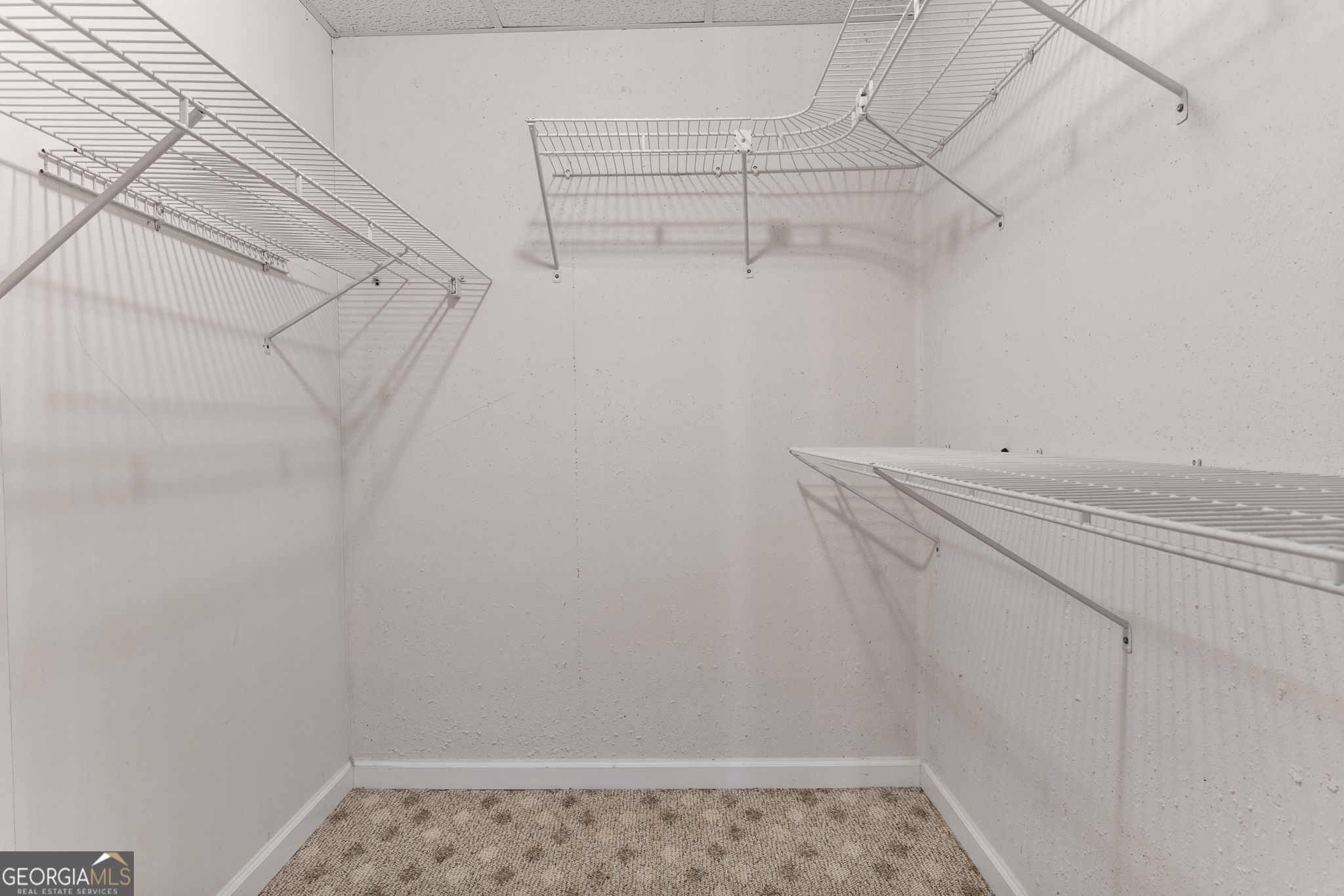 400 Moseley Road Stockbridge, GA 30281 - Photo 46 of 70 a view of a room with racks on the wall