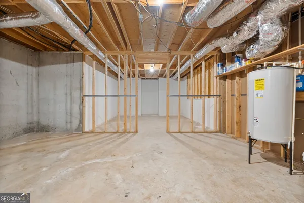 a view of a house with snow on the road