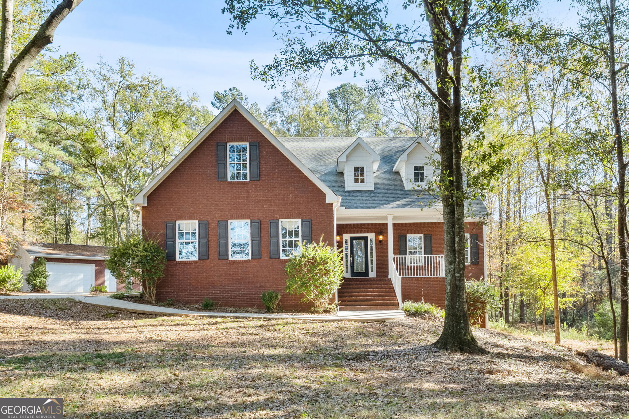 400 Moseley Road Stockbridge, GA 30281 - Photo 5 of 70 a front view of a house with a yard