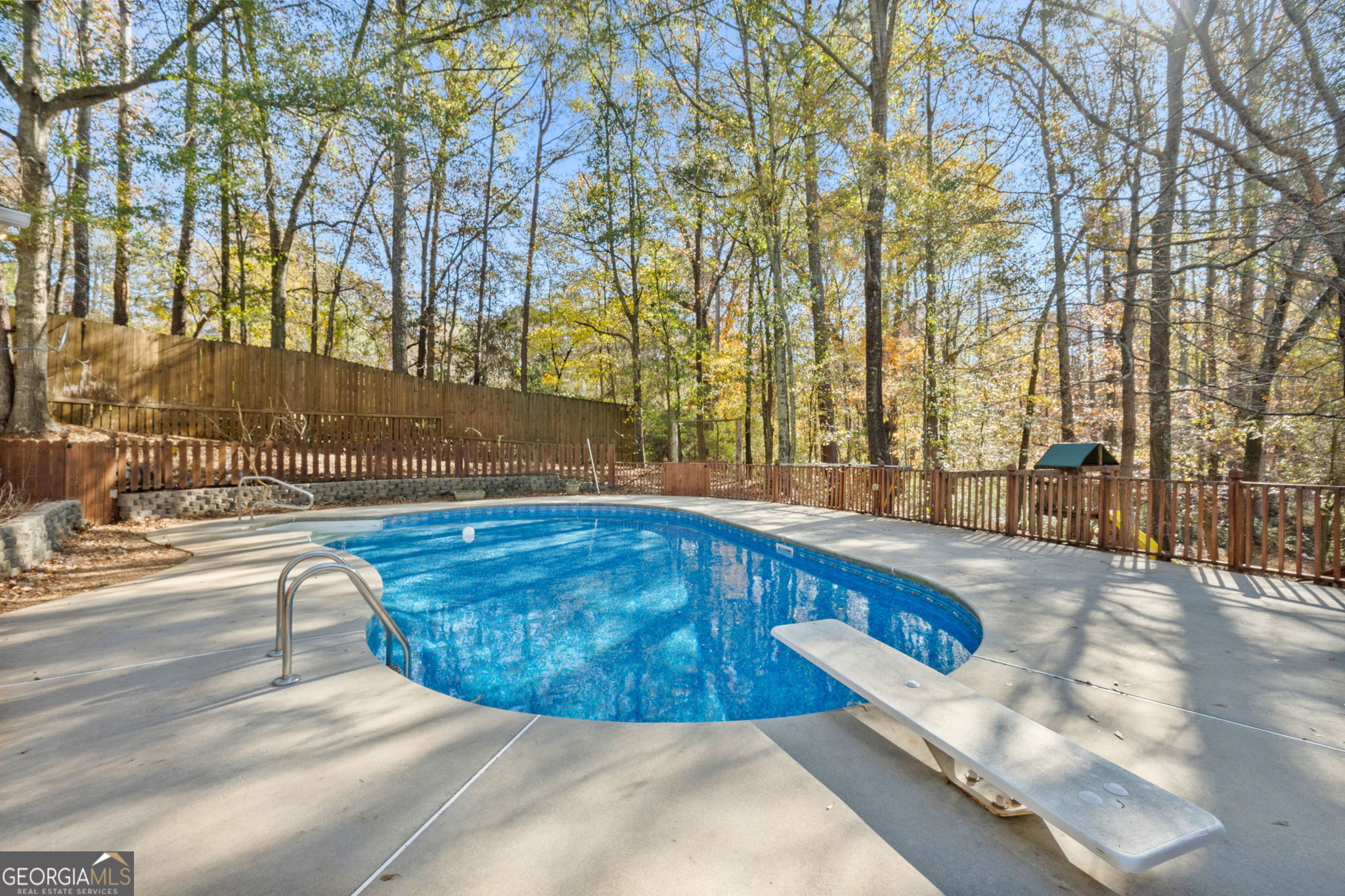 400 Moseley Road Stockbridge, GA 30281 - Photo 54 of 70 a view of a swimming pool with an outdoor space