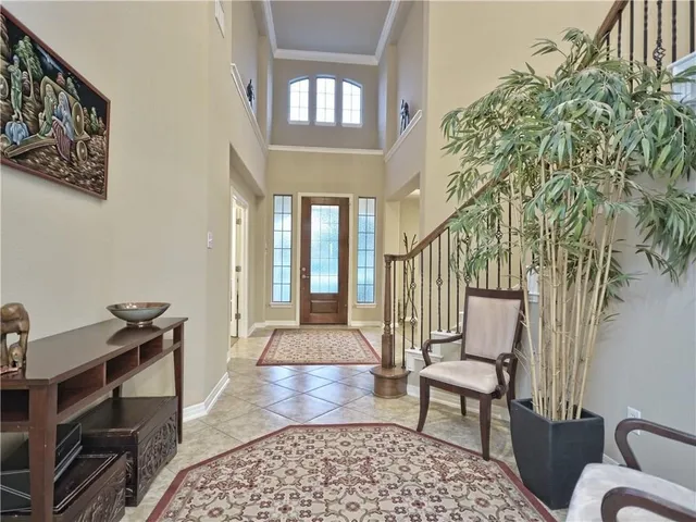 a view of a livingroom with a furniture and staircase