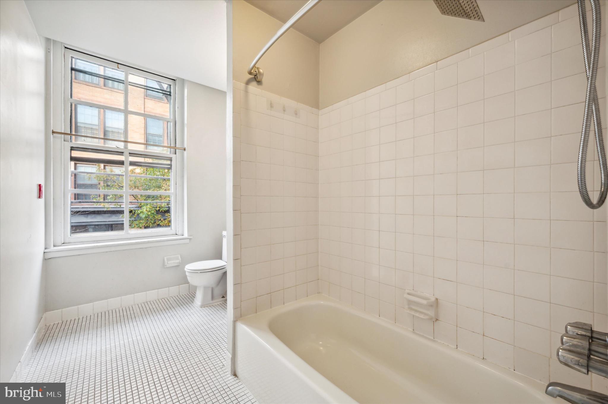 162 North 3rd Street, Unit 2 Philadelphia, PA 19106 - Photo 11 of 17 a bathroom with a bathtub and a shower