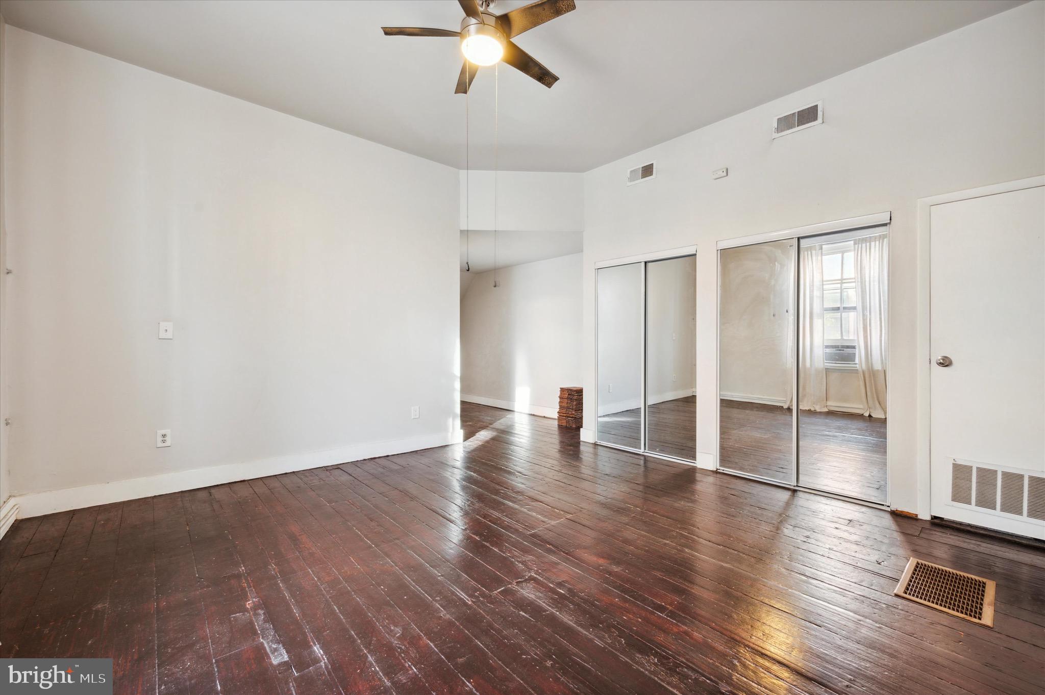 162 North 3rd Street, Unit 2 Philadelphia, PA 19106 - Photo 14 of 17 a view of an empty room with wooden floor