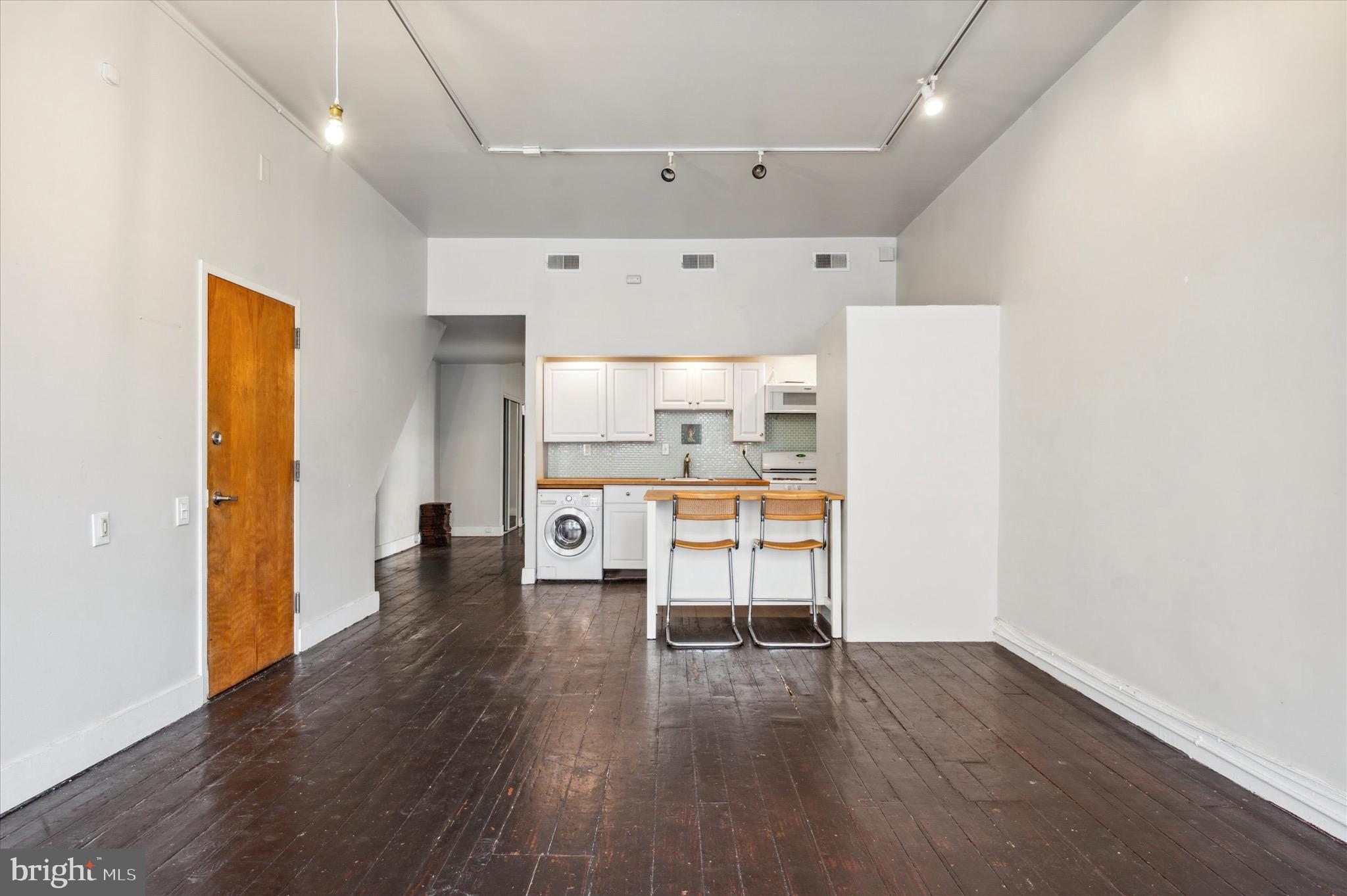 162 North 3rd Street, Unit 2 Philadelphia, PA 19106 - Photo 6 of 17 a view of a kitchen with wooden floor