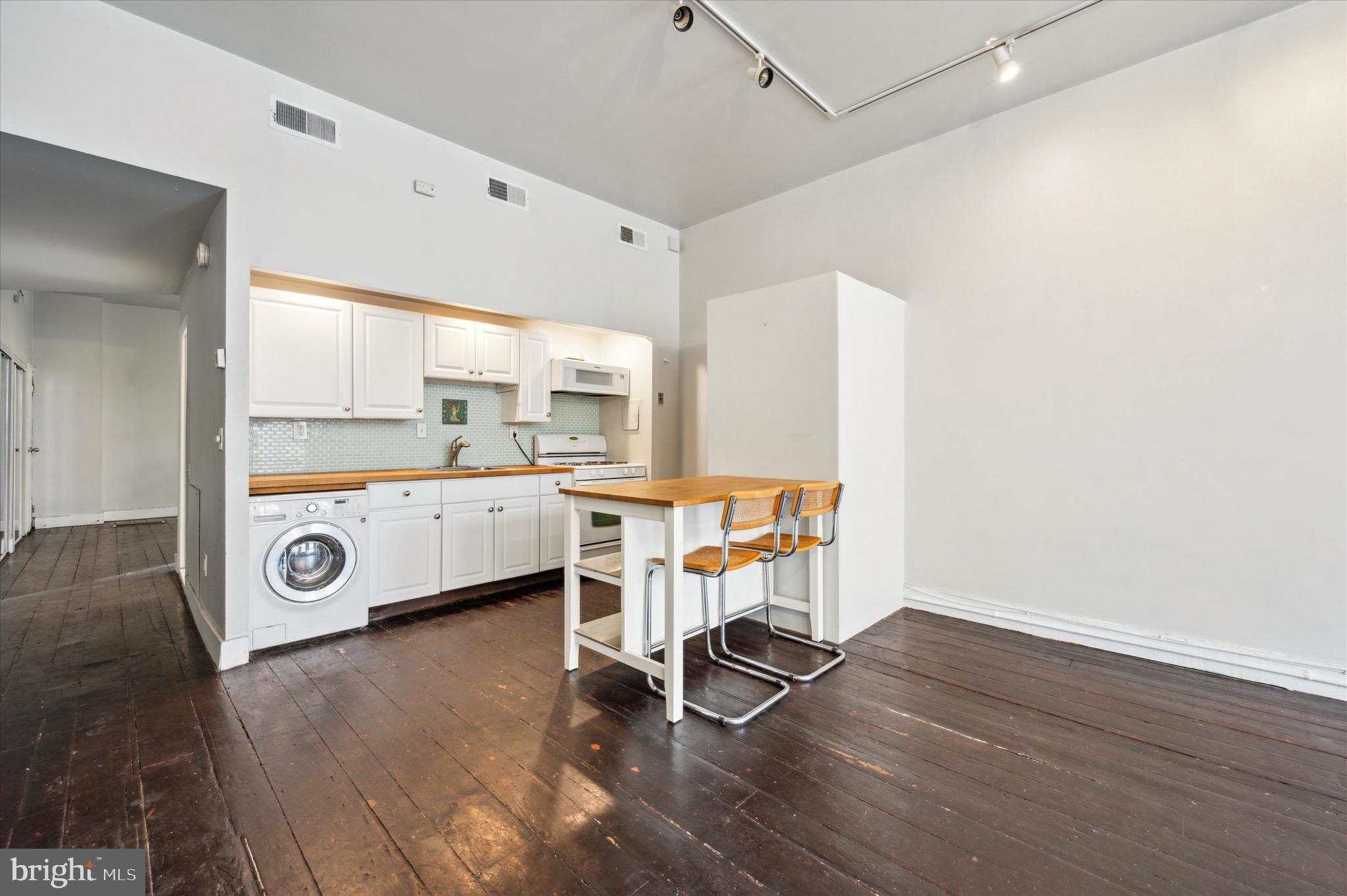 162 North 3rd Street, Unit 2 Philadelphia, PA 19106 - Photo 7 of 17 a view of a workspace with furniture and a table