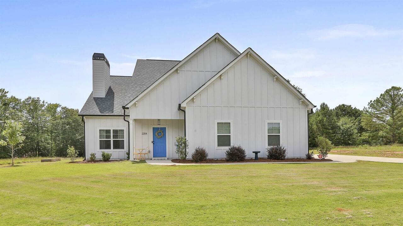 2204 Blanton Mill Road Williamson, GA 30292 - Photo 1 of 1 a view of a house with pool and chairs