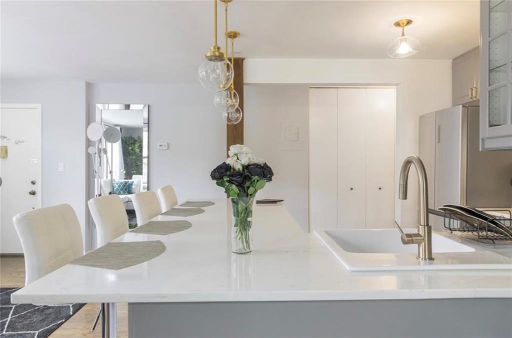 54 Erasmus Street, Unit 2D Brooklyn, NY 11226 - Photo 3 of 7 a close view of dining table with chairs