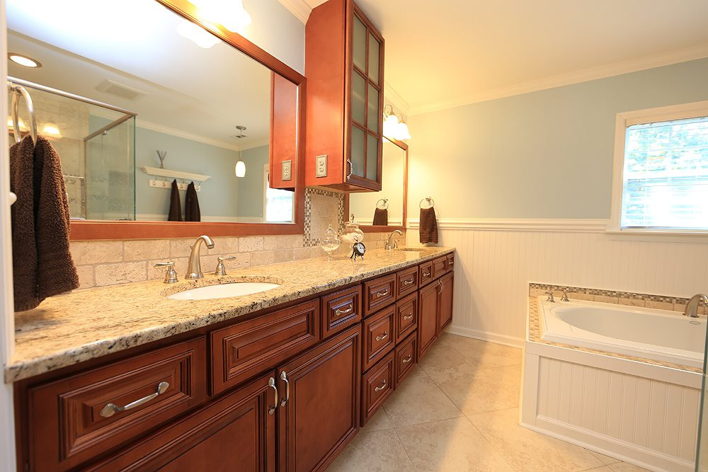 2104 Treverton Place Raleigh, NC 27609 - Photo 14 of 25 Completely remodeled with new vanity, granite tops, dual sinks, soaker tub and large, all-tile shower. Master Bathroom