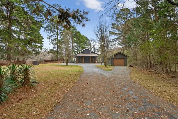 a view of house with outdoor space