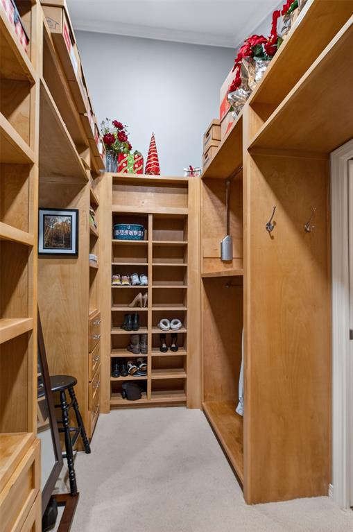 504 Moore Road Elm Grove, LA 71051 - Photo 25 of 37 a view of walk in closet with clothes and shoes
