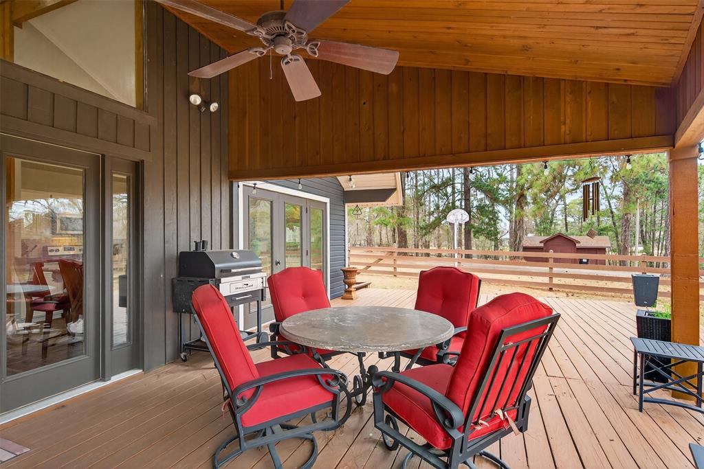 504 Moore Road Elm Grove, LA 71051 - Photo 29 of 37 a outdoor dining space with furniture and umbrella