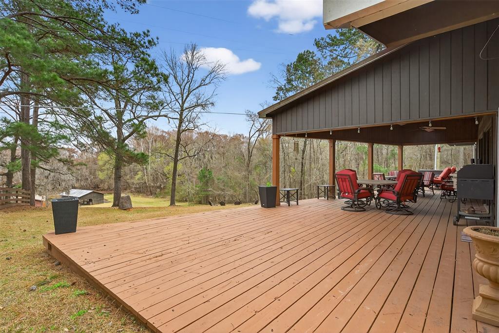 504 Moore Road Elm Grove, LA 71051 - Photo 31 of 37 a view of a backyard with sitting area