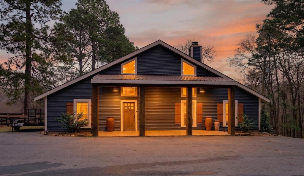 504 Moore Road Elm Grove, LA 71051 - Photo 37 of 37 a front view of a house with barbeque and trees