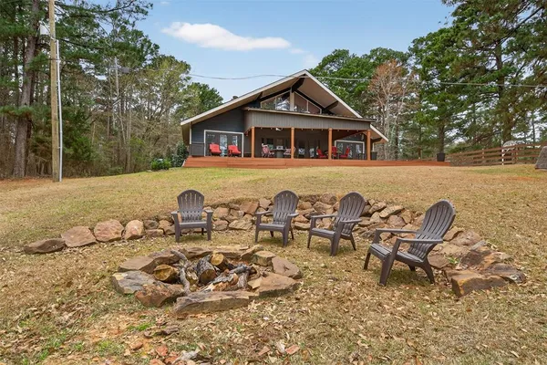 a front view of a house with swimming pool