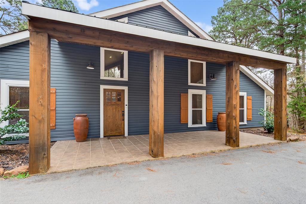 504 Moore Road Elm Grove, LA 71051 - Photo 8 of 37 a front view of a house with outdoor seating