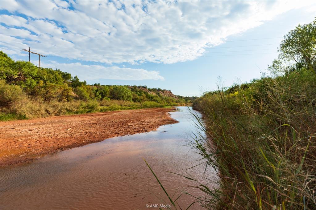 107 C R 107 Aspermont, TX 79502 - Photo 17 of 40 a view of a beach with a yard