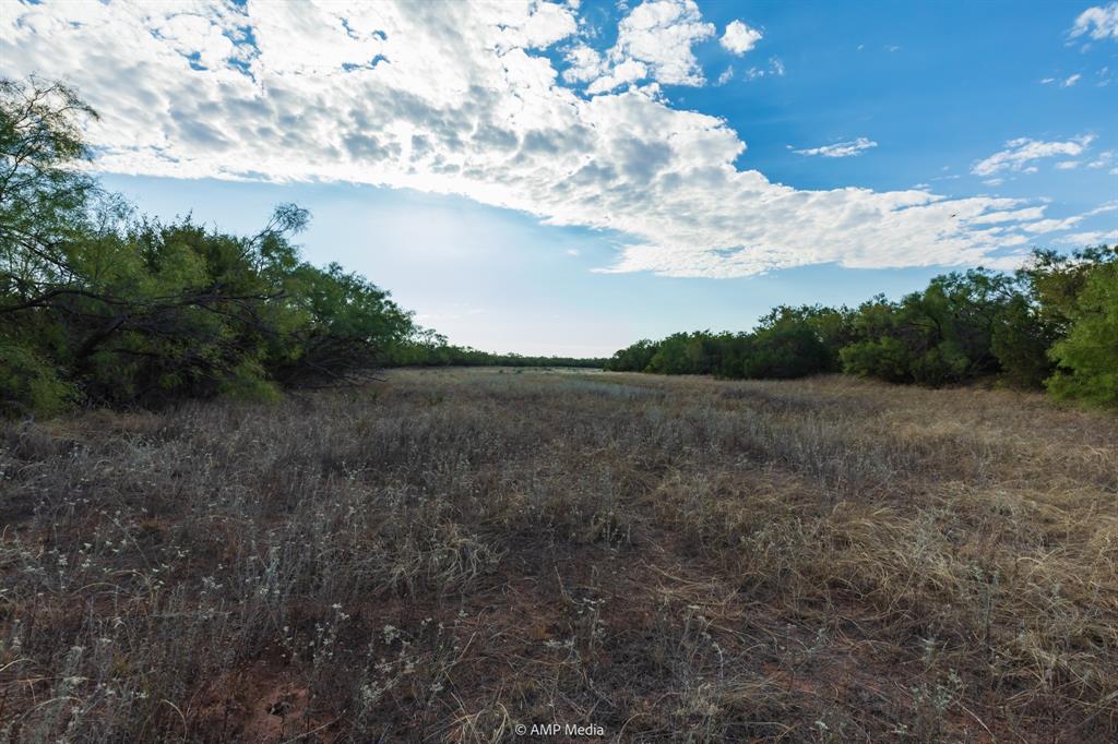 107 C R 107 Aspermont, TX 79502 - Photo 26 of 40 a view of a dry yard with lots of green space