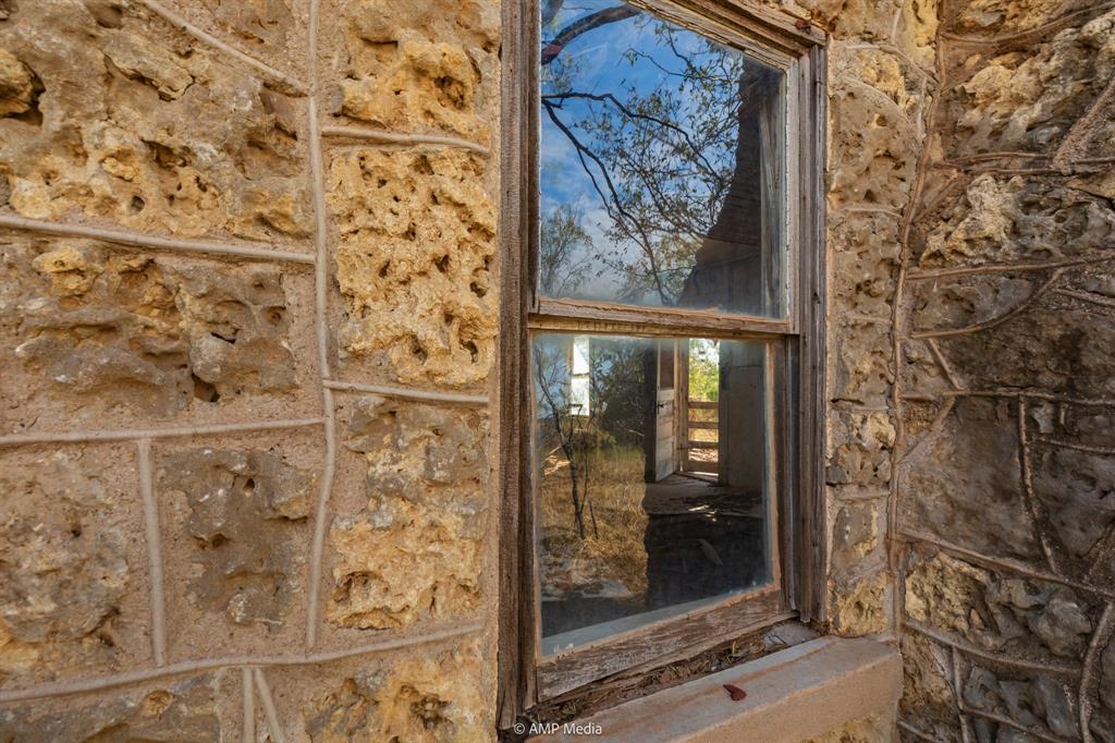 107 C R 107 Aspermont, TX 79502 - Photo 27 of 40 a bathroom with a shower and a mirror