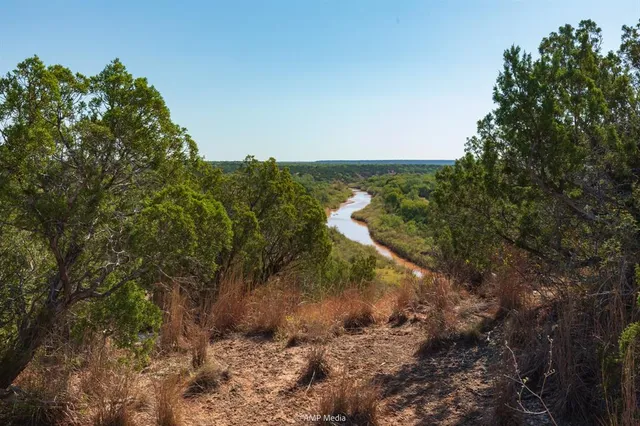 a view of a lake with outdoor space