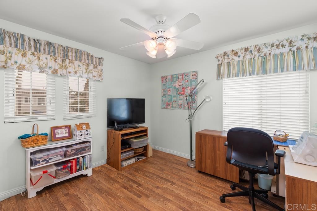 7301 Seafarer Place Carlsbad, CA 92011 - Photo 32 of 33 a view of a workspace with furniture and a window