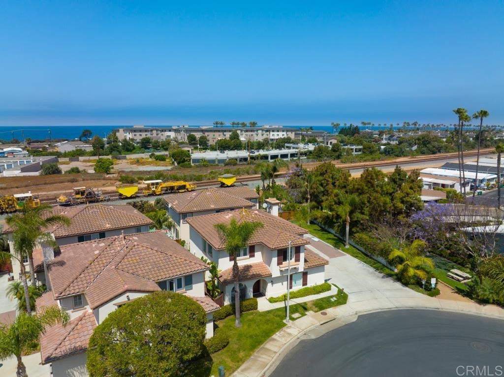 7301 Seafarer Place Carlsbad, CA 92011 - Photo 4 of 33 an aerial view of a house with a garden