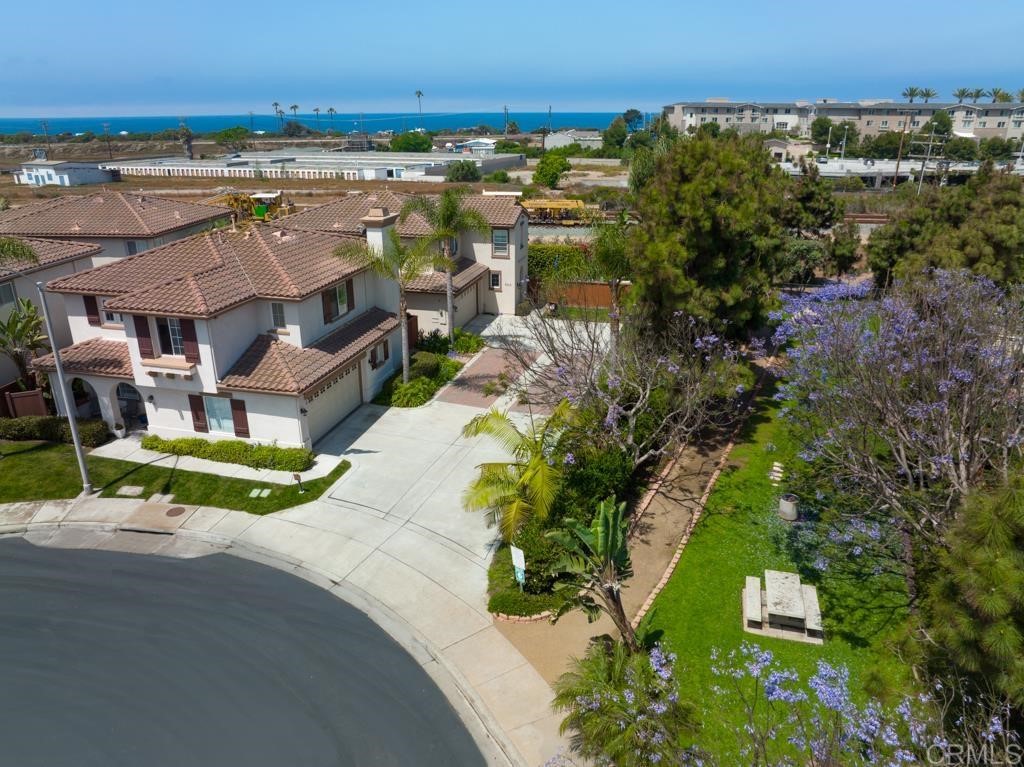7301 Seafarer Place Carlsbad, CA 92011 - Photo 5 of 33 an aerial view of a house with a yard basket ball court and outdoor seating