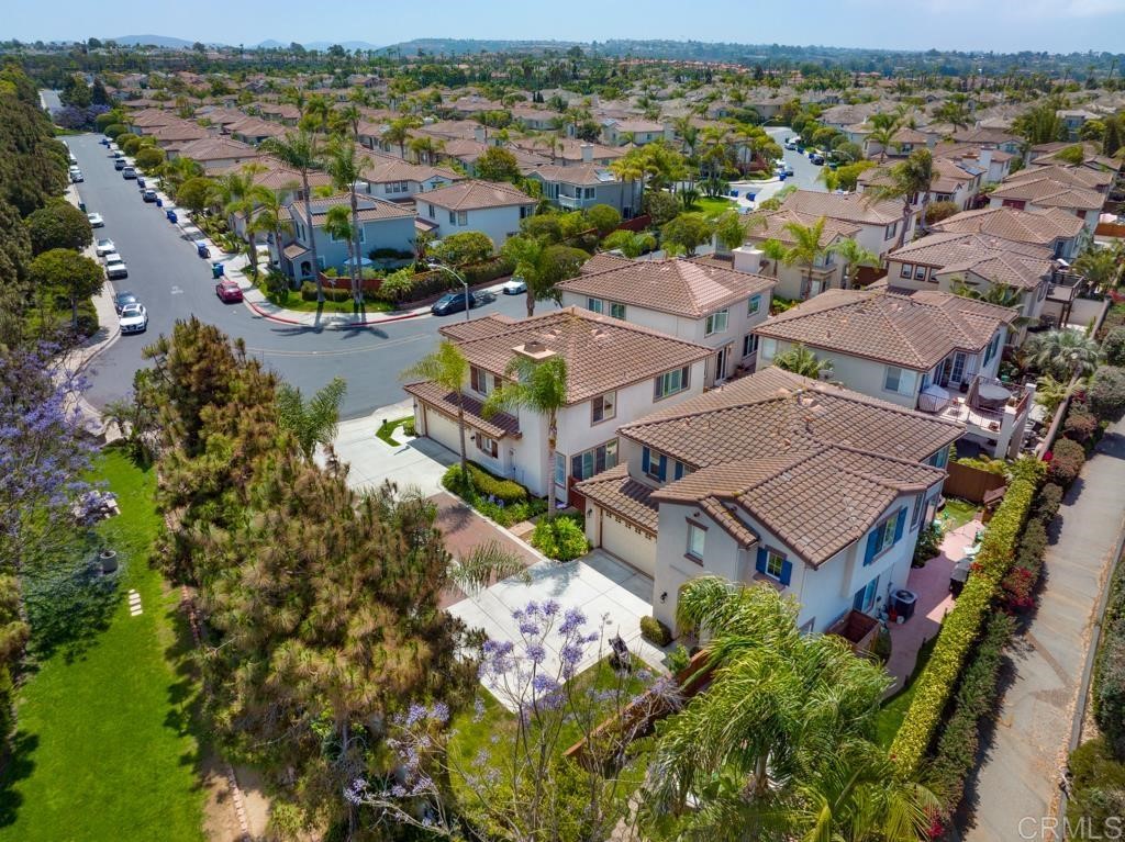 7301 Seafarer Place Carlsbad, CA 92011 - Photo 7 of 33 an aerial view of a house with a lake view