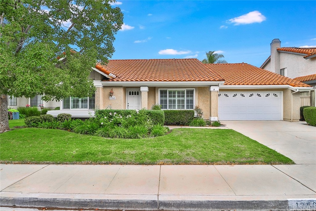 12569 Crystal Ranch Road Moorpark, CA 93021 - Photo 1 of 1 a view of a house with a yard
