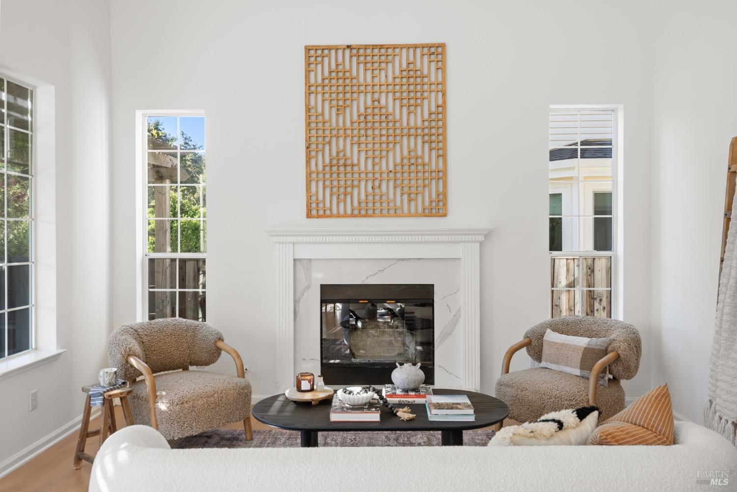 8 Pacific Drive Novato, CA 94949 - Photo 13 of 37 a living room with furniture and a fireplace
