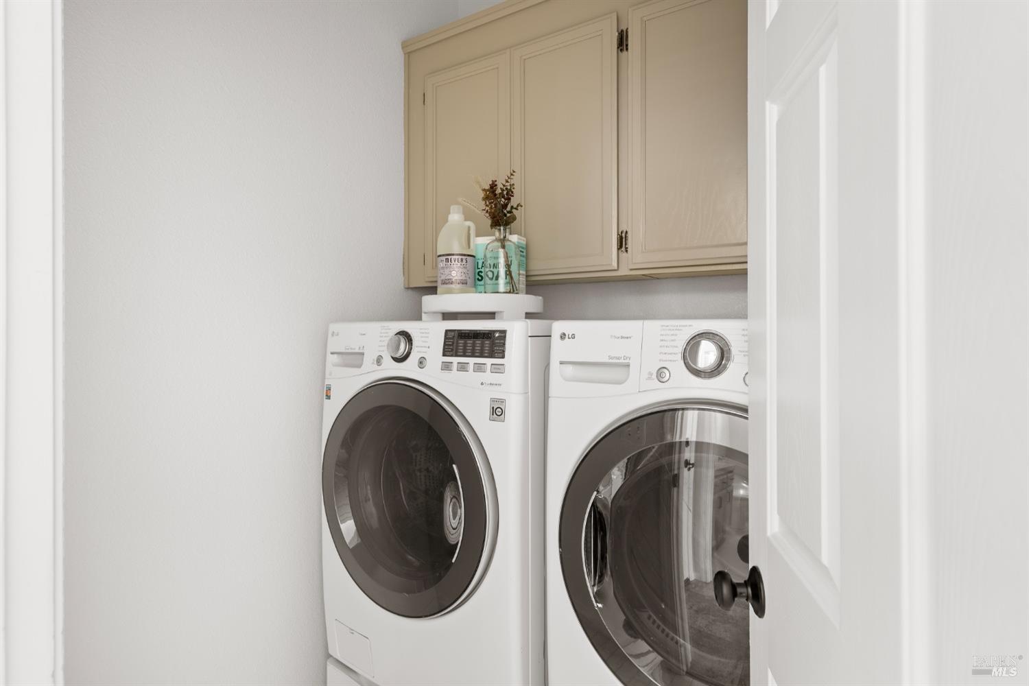 8 Pacific Drive Novato, CA 94949 - Photo 18 of 37 a utility room with dryer and washer