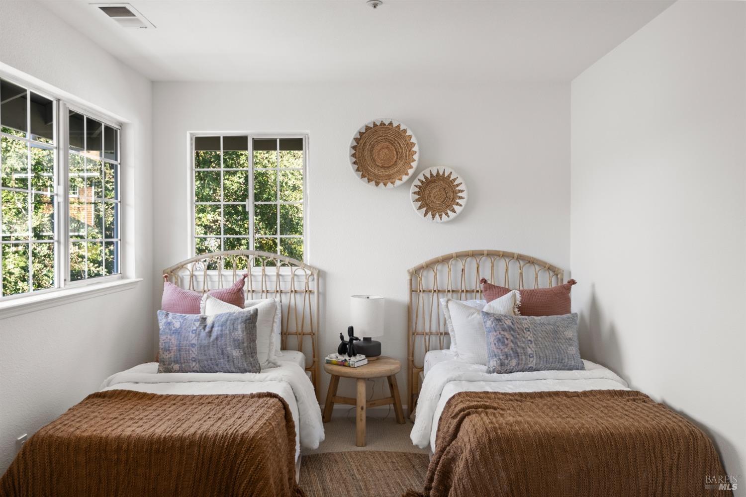 8 Pacific Drive Novato, CA 94949 - Photo 27 of 37 a bedroom with two beds and a large window