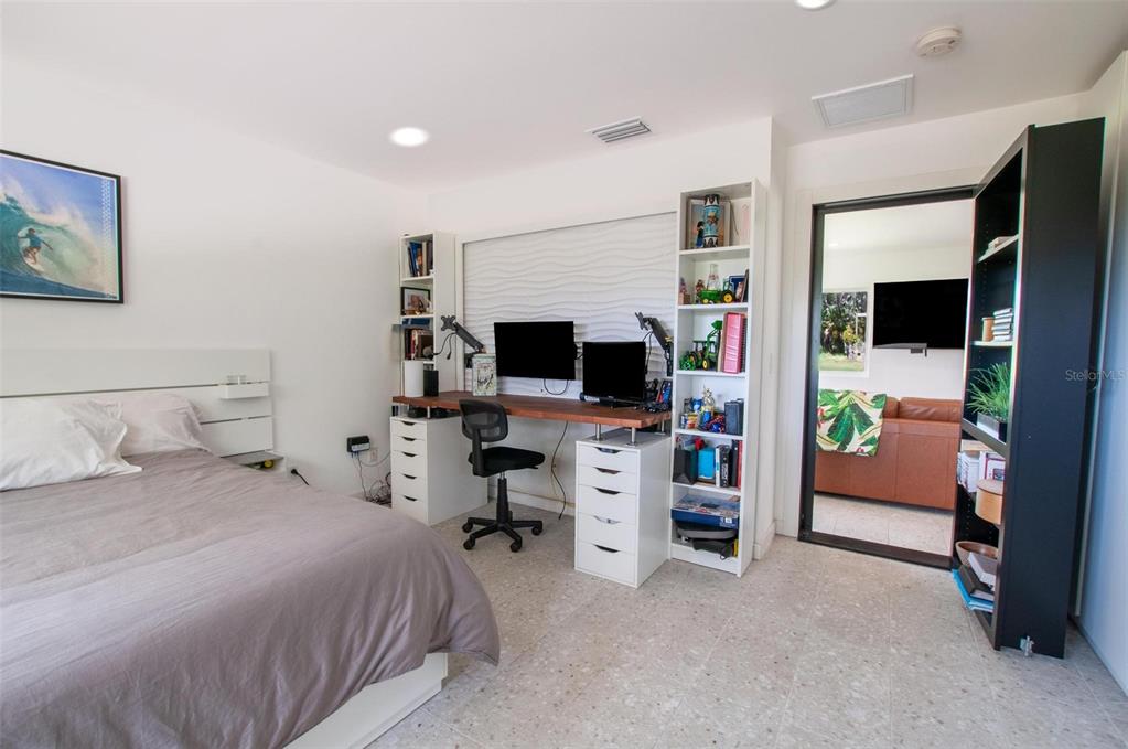 1635 Southwest Rodgers Avenue Arcadia, FL 34266 - Photo 20 of 32 a bedroom with a bed and a flat screen tv