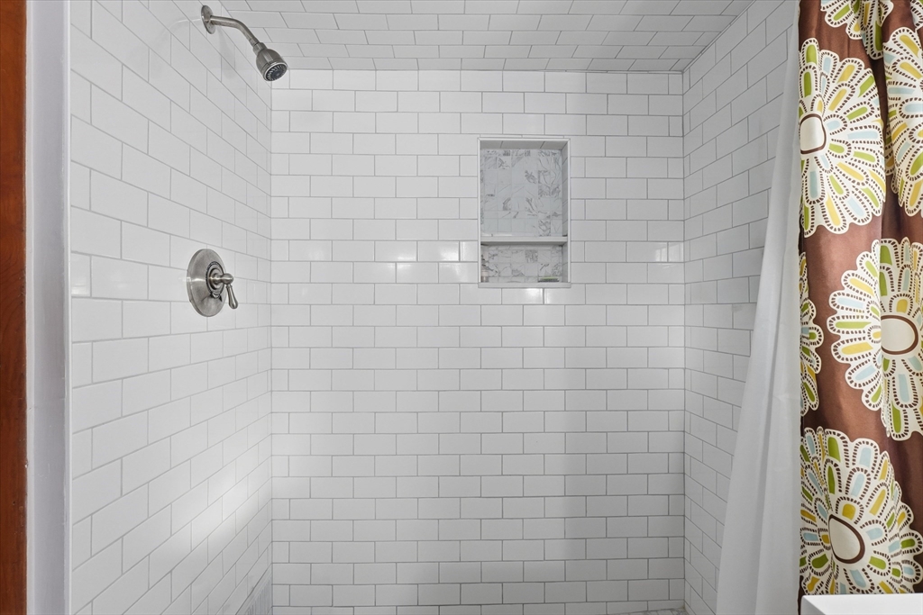 59 Fay Street Lowell, MA 01852 - Photo 17 of 33 a bathroom with a shower