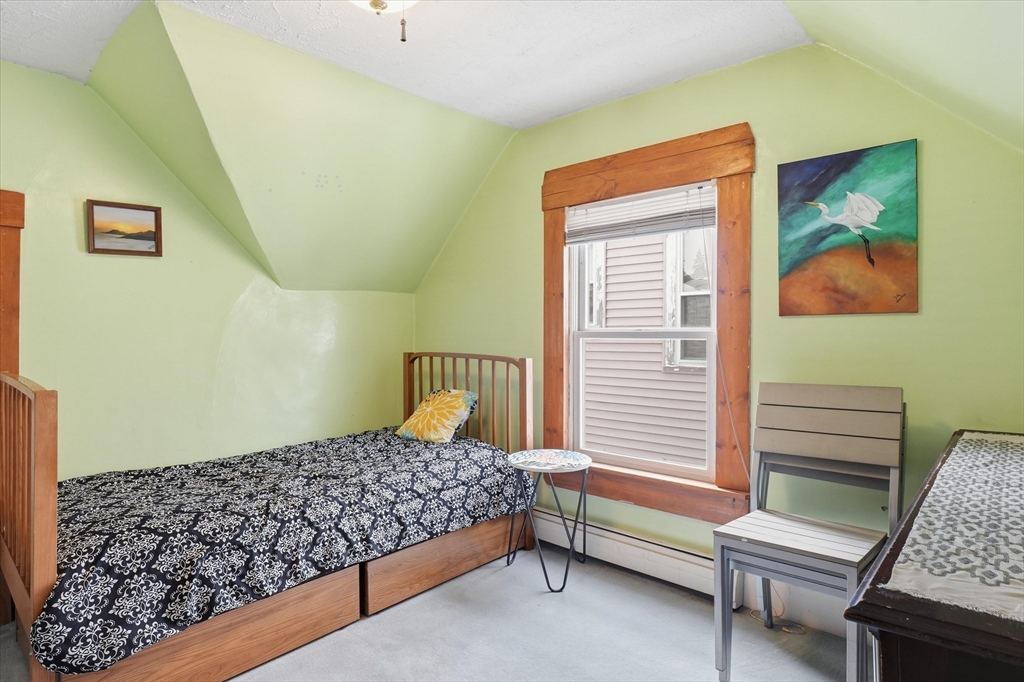 59 Fay Street Lowell, MA 01852 - Photo 20 of 33 a bedroom with a bed and a window
