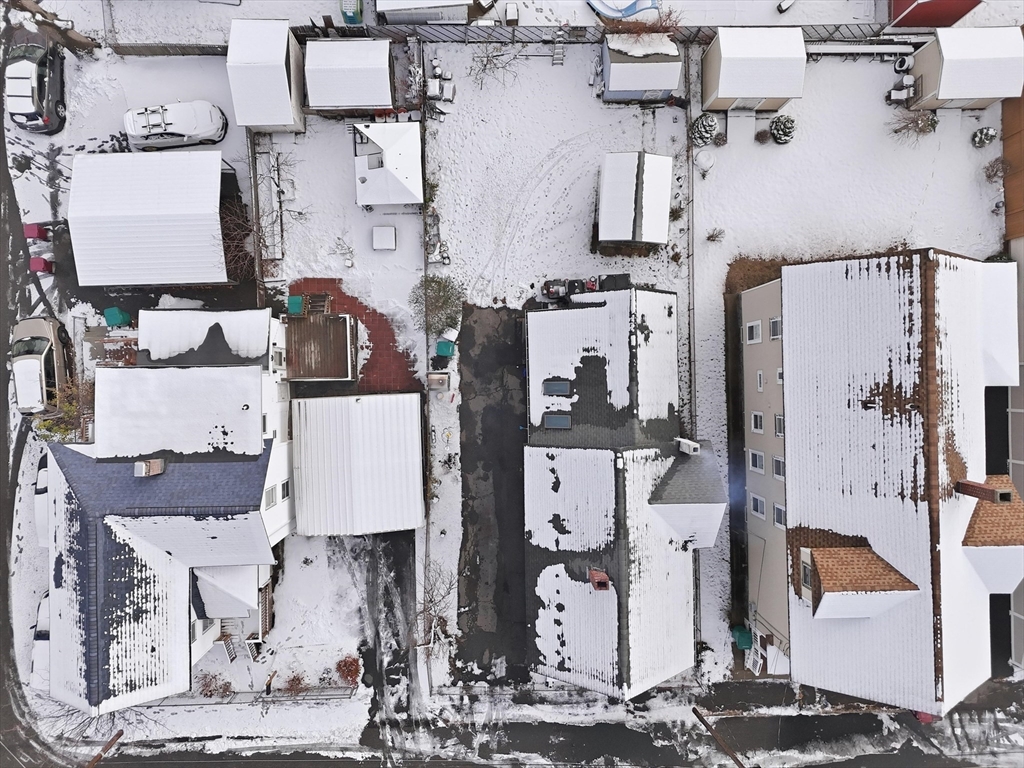 59 Fay Street Lowell, MA 01852 - Photo 29 of 33 an aerial view of residential houses with outdoor space
