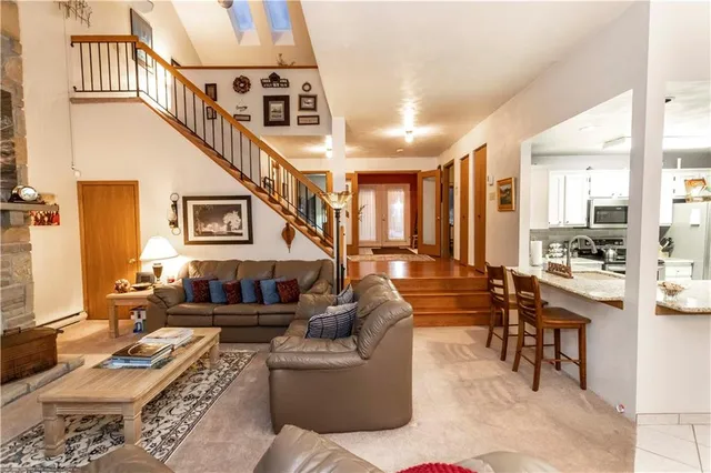 a view of a dining room kitchen and livingroom