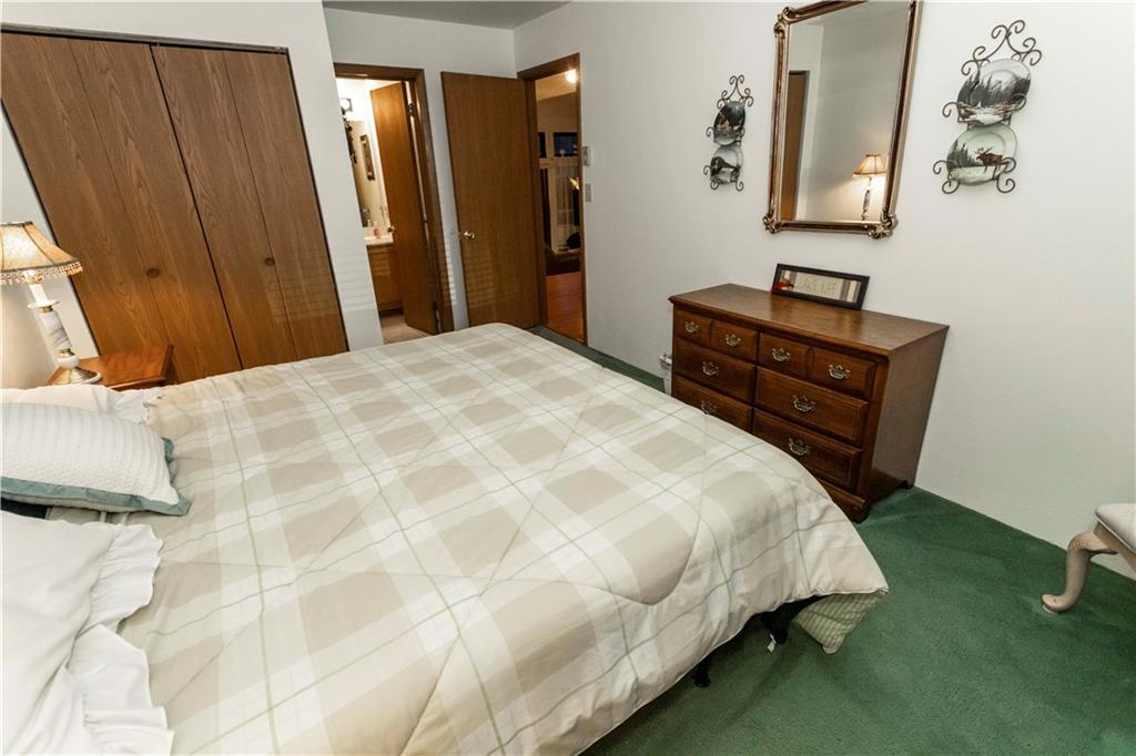 1918 South Ridge Court Hidden Valley, PA 15502 - Photo 15 of 41 a bedroom with a bed and a dresser