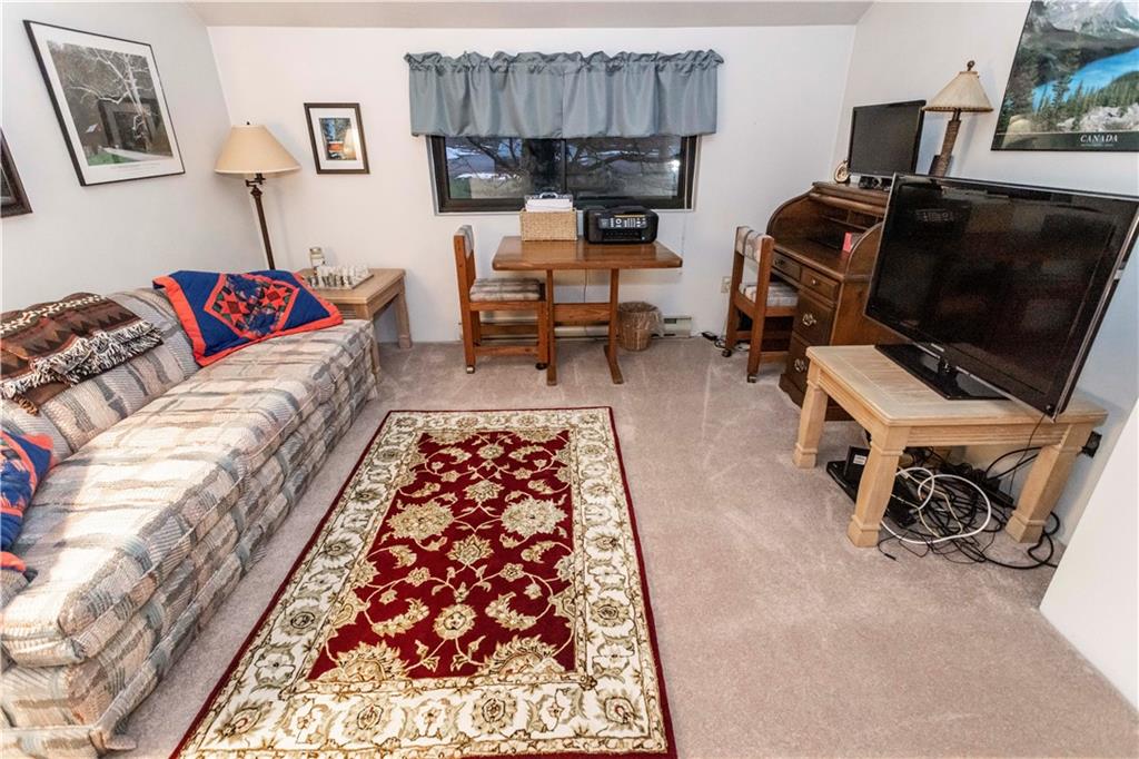 1918 South Ridge Court Hidden Valley, PA 15502 - Photo 21 of 41 a living room with furniture and a flat screen tv