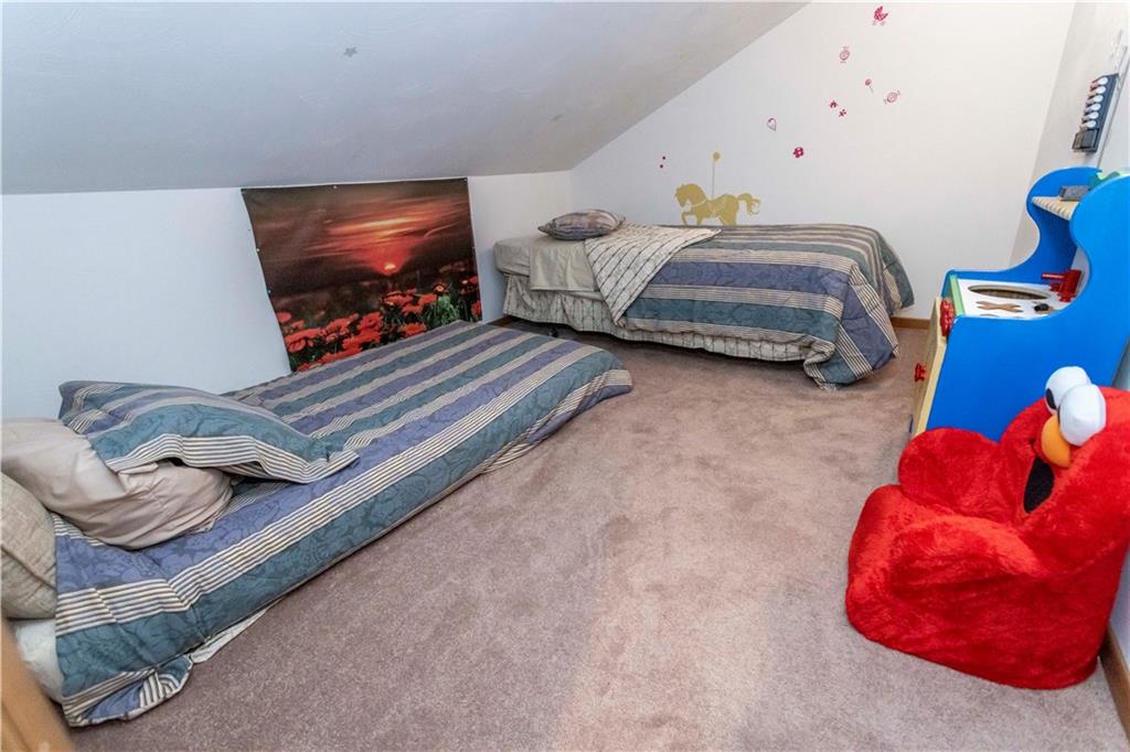 1918 South Ridge Court Hidden Valley, PA 15502 - Photo 28 of 41 a living room with furniture and a flat screen tv